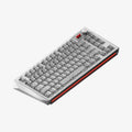 Mechanical keyboard with red accents on a white background