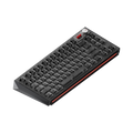 Black mechanical keyboard with red accents on a white background
